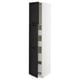 A tall, white METOD kitchen cabinet with black stained lerhyttan wooden doors. It has shelves inside and is designed for storage.