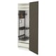 An open METOD cabinet in dark brown with beige accents, featuring pull-out organisers and shelves inside.