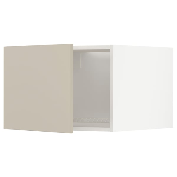 A beige METOD kitchen cabinet with a hinge and a smooth, clean design.