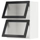 Black metal-framed glass doors with horizontal lines, part of a modern kitchen system.