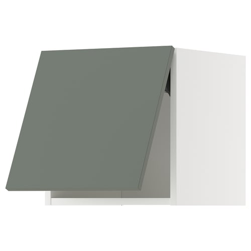 A modern kitchen cabinet in grey-green with a sleek, angled design.