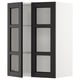 Black stained glass kitchen cabinet with bevelled edges and adjustable shelves. Modern design, part of the METOD kitchen system.