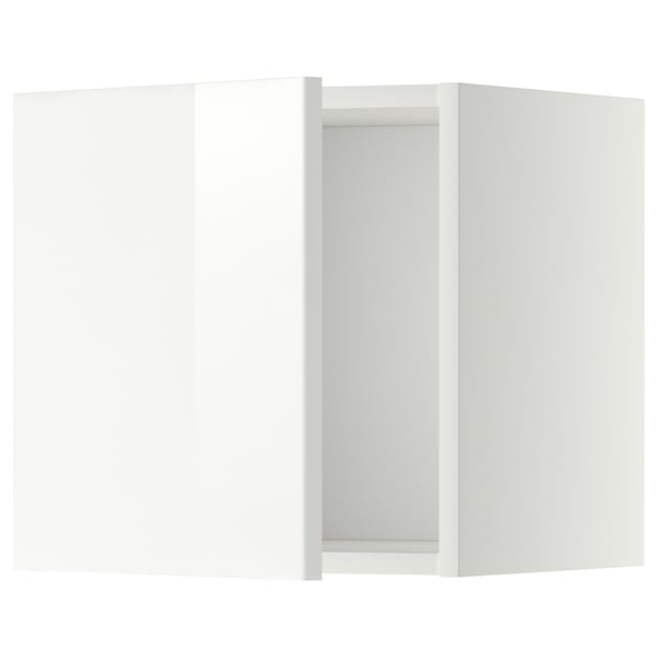 White METOD kitchen cabinet with high-gloss finish.