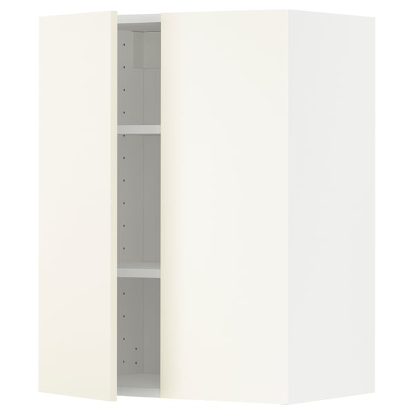 A white METOD kitchen cabinet with adjustable shelves and a door that can be mounted on either side.