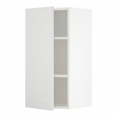 White METOD kitchen cabinet with adjustable shelves, sleek modern design.