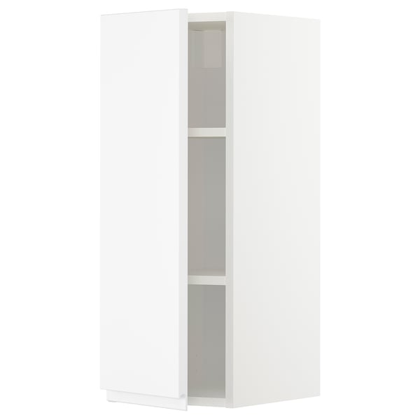 Modern white kitchen cabinet, tall, minimalist, with three shelves.