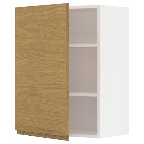 A modern, white kitchen cabinet with an oak-look door and two shelves.