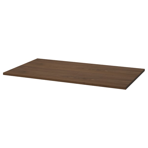 The MITTZON table top is dark brown, rectangular, and made from walnut veneer. Its designed for easy cleaning.