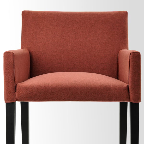 Rust-red MÖRBYLÅNGA chair, padded seat, wide armrests, wooden legs. Modern dining comfort.