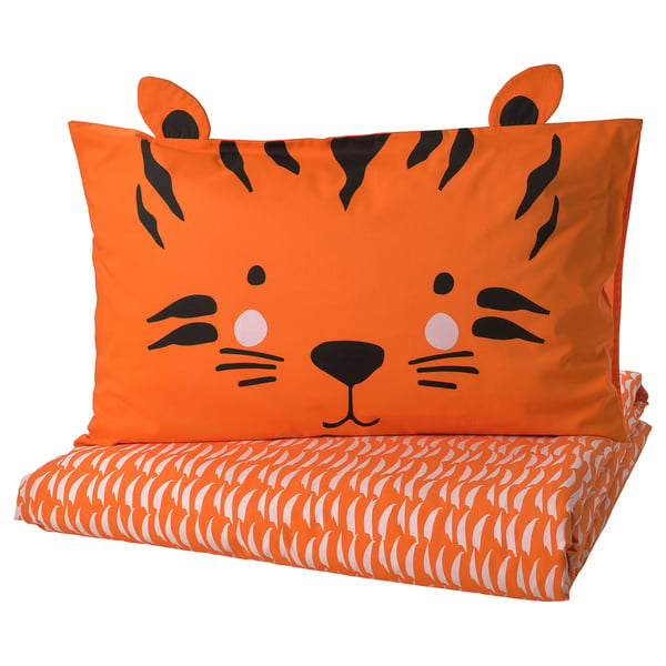 Vibrant orange tiger-themed bedding set, featuring a playful tiger pillowcase and matching sheet with white stripes, made from soft cotton blend.