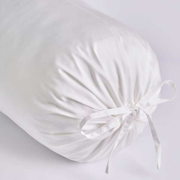 A luxurious, white satin bolster pillowcase tied with a bow, exuding smoothness and elegance.