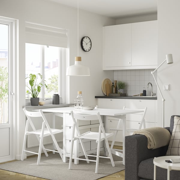 NORDEN table & chairs in small kitchen, maximising space with a cosy, modern feel.