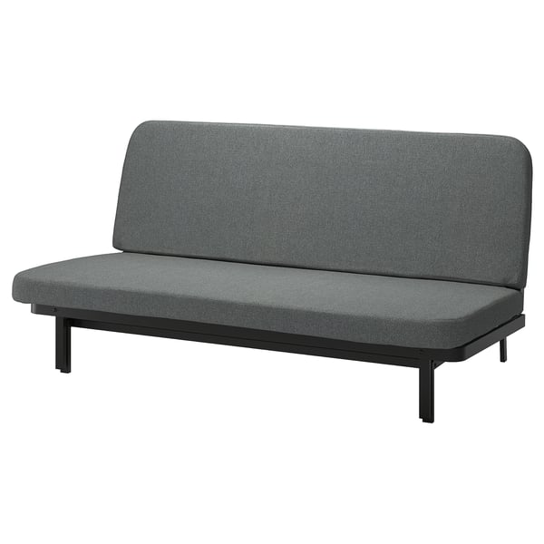 Displays a grey NYHAMN sofa-bed with a sleek, modern design. It a steel frame, a click-mechanism for conversion, and under-seat storage.