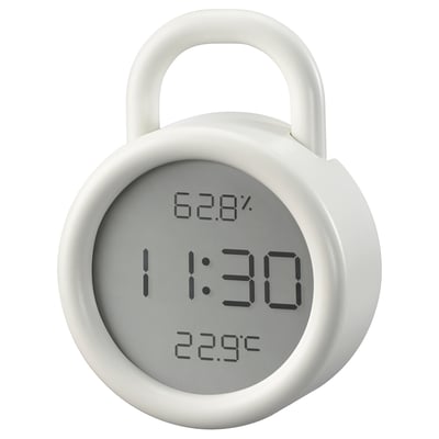 A round, white ÖRNVRÅK clock with a hook, displaying time, temperature, and humidity. The screen shows 11:30, 62. 8% humidity, and 22. 9°c.