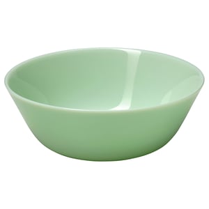 Green glass bowl, simple design, rounded shape. Great for serving food. Safe for dishwasher and microwave.