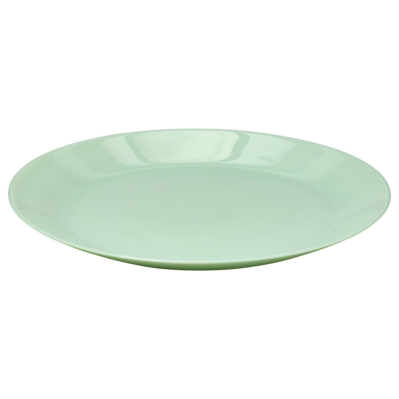The OFTAST dish is a sleek, round, light green glass plate. Its smooth, plain design is ideal for modern table settings.