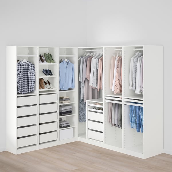 A well-organized closet with clothes hangers, shelves, and drawers, maximising corner space.