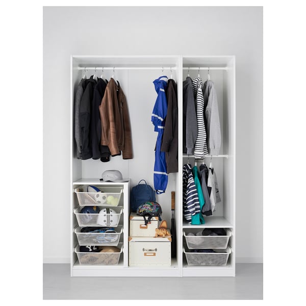 White PAX wardrobe with organised clothes and accessories.