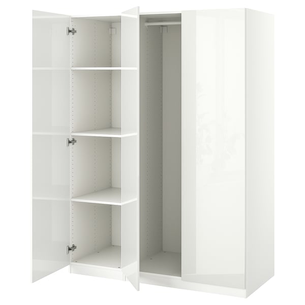 White PAX wardrobe with open mirrored doors, four empty shelves.