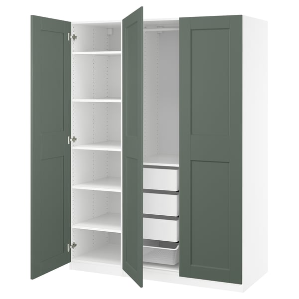 Green PAX wardrobe. Open doors showcase white shelves and mesh drawer. Modern, storage-focused design.