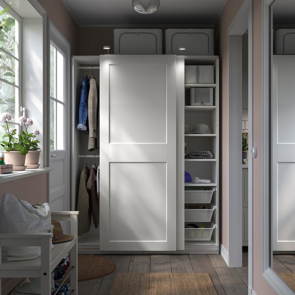 Modern white wardrobe with shelves, hanging space, and 10-year guarantee.