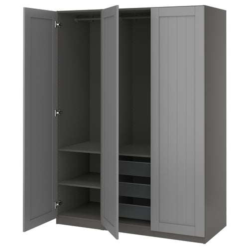A grey PAX wardrobe with open doors, displaying shelves and a mesh drawer.