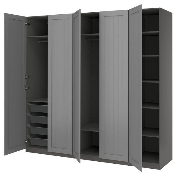 Grey PAX wardrobe with open doors; two sections, one with shelves and hanging rail, the other with drawers.