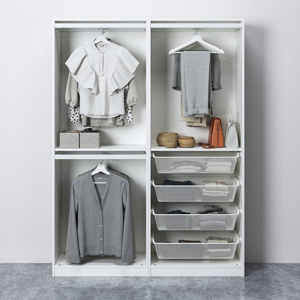 White wardrobe with organised clothes, accessories, and baskets. Sliding doors, adjustable, space-saving.