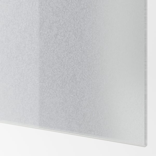 Close-up of white textured surface, smooth and even, fine grain visible.