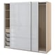 Modern light-colored wooden wardrobe with sliding doors and compartments.