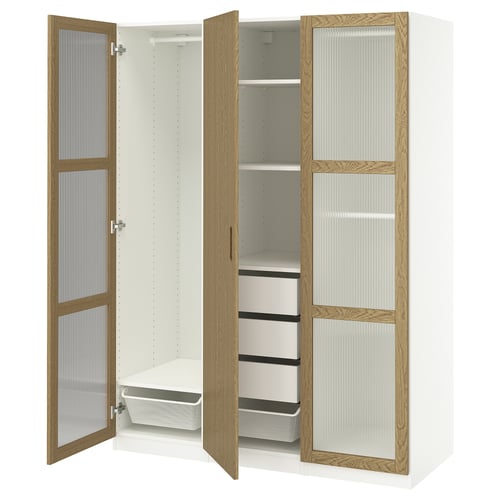 White & oak PAX wardrobe open, showing shelves & drawers.
