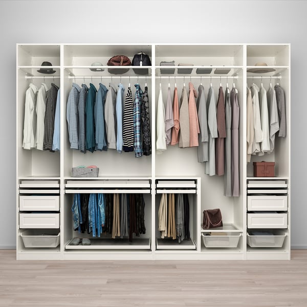 Modern white wardrobe with sliding doors, hanging clothes, drawers, shelves, organising trays, and accessories.