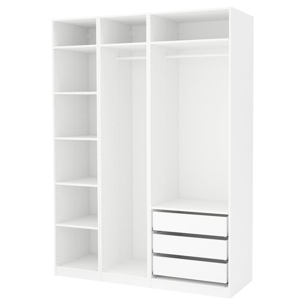 A white PAX wardrobe with shelves and drawers.
