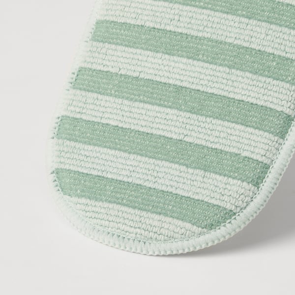 Close-up of green and white striped PEPPRIG microfiber pad, showcasing quality texture and design.