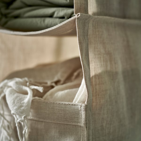 Hanging fabric storage with multiple compartments for organising clothes, part of the PURRPINGLA series.