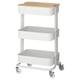 White RÅSKOG storage trolley with bamboo top, four wheels.