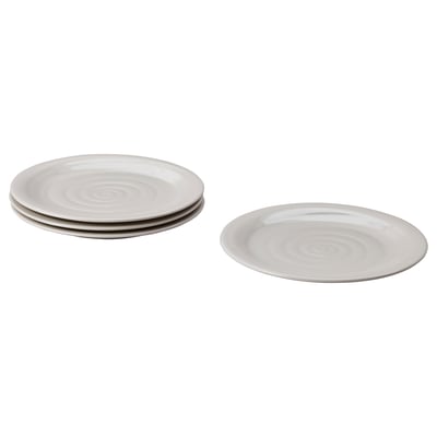 Four grey stoneware plates, one separate, three stacked with spiral centres.