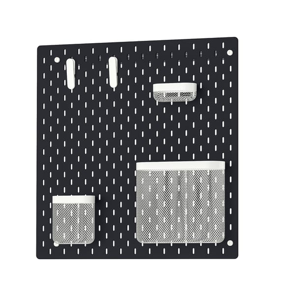 SKÅDIS black pegboard with white accessories: baskets, clips, organised.
