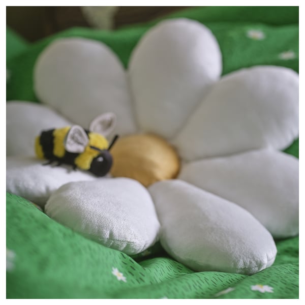 Soft, plush flower-shaped cushion with toy bee; high-quality, recycled materials.
