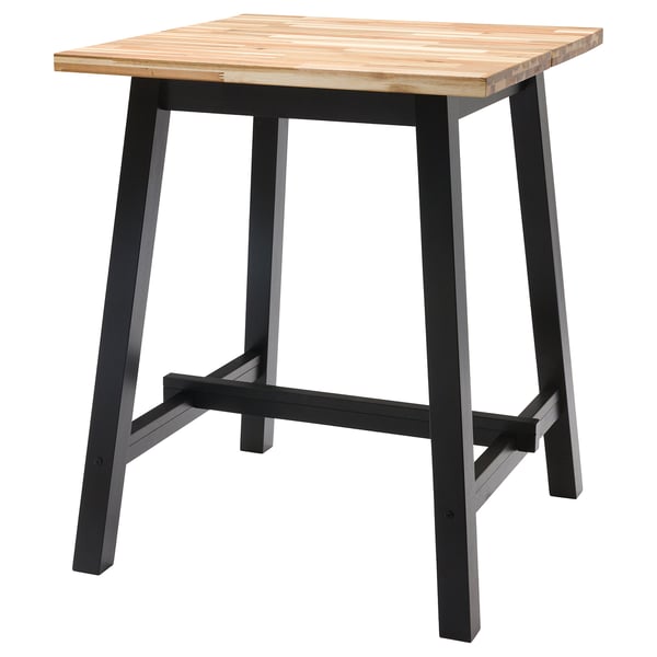 SKOGSTA table: square light wood top, dark metal legs, sturdy design.