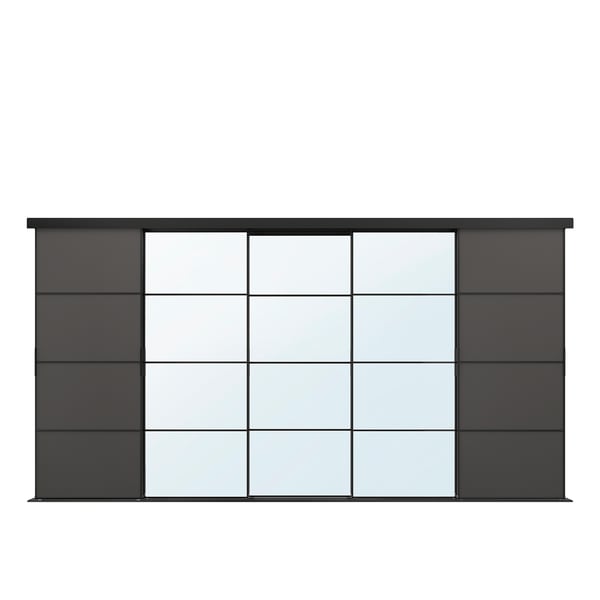 A modern SKYTTA sliding door, featuring black aluminium frames with transparent glass panels and dark panels on either side.