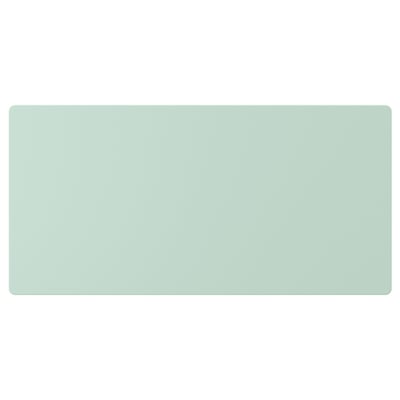 Green rectangular flat surface, likely a drawer front, smooth and plain.