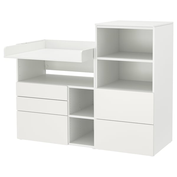White SMÅSTAD changing table with shelves and drawers.