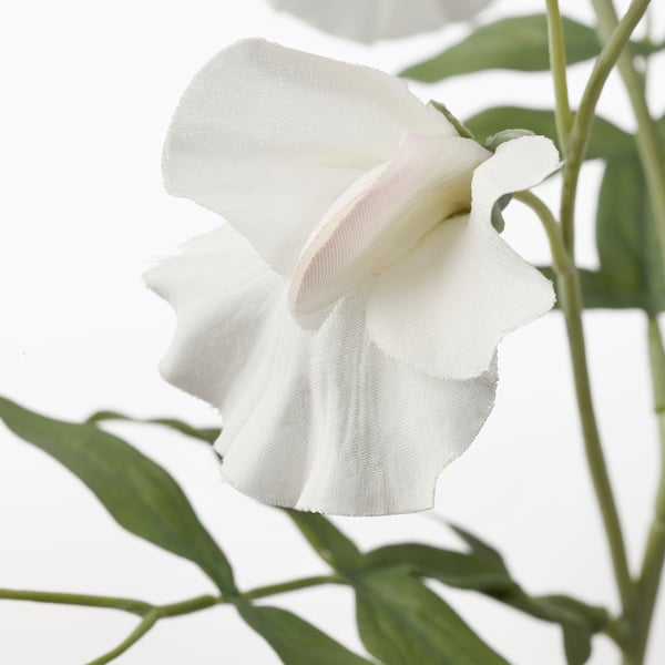 Artificial white flower with green leaves, lifelike and realistic, perfect for long-lasting decoration.