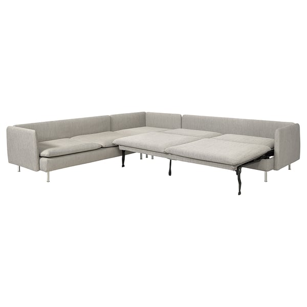 A beige SÖDERHAMN sectional sofa bed with sleek, modern lines and high legs, designed for comfort and functionality.