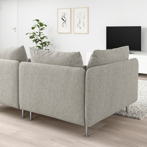 Modern living room with SÖDERHAMN sectional sofa, tv, art, and plant.