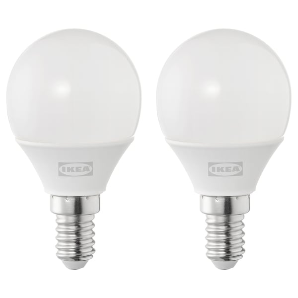 Two round, white led light bulbs by IKEA, made of durable plastic, standing upright on a white background.