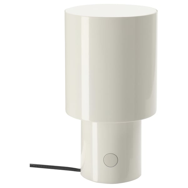 A white SPETSBOJ table lamp with a cylindrical shape, featuring a dimmable design.