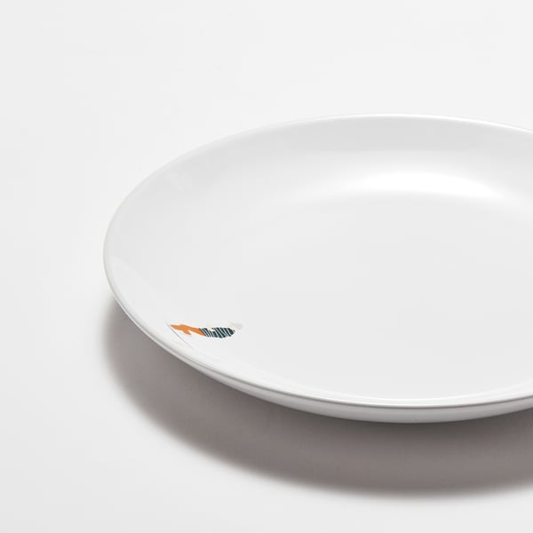 Small white plate with colourful edge, charming for desserts or apps.