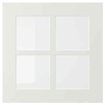 The STENSUND white cabinet a classic design with glass doors, framed by fibreboard and acrylic paint, showcasing a neat and organised space.